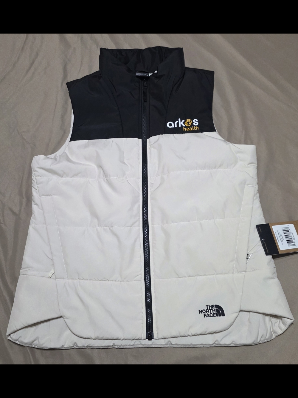 The North Face Womens Medium Vest Puffer Cream Black Arkos Health Logo Insulated